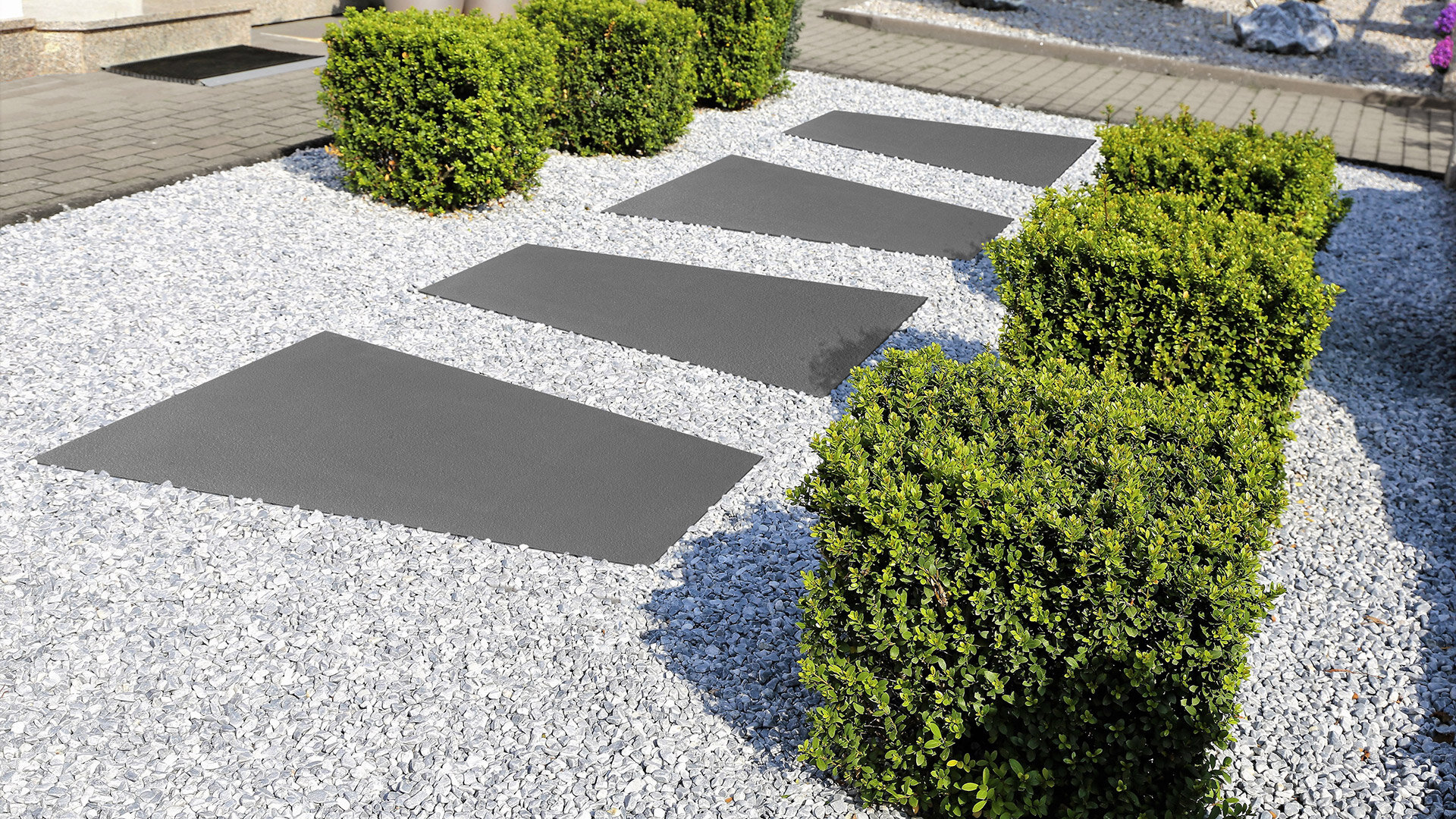 Slider Bild einer Terrasse mit Titania Trapezplatte
