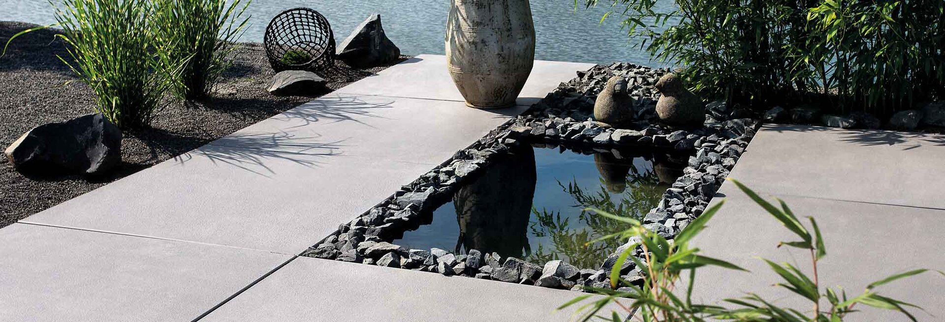 Slider Bild einer Terrasse mit Titania Platten titania platingrau
